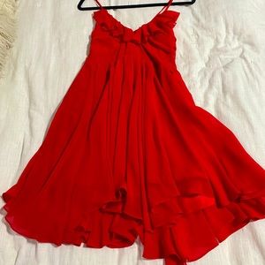 Low back red party dress with cute frill details